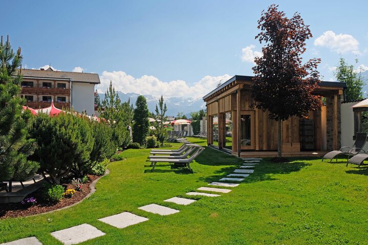 Garden sauna with mountain view